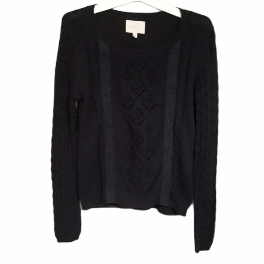 Skies are blue cable knit navy blue sweater